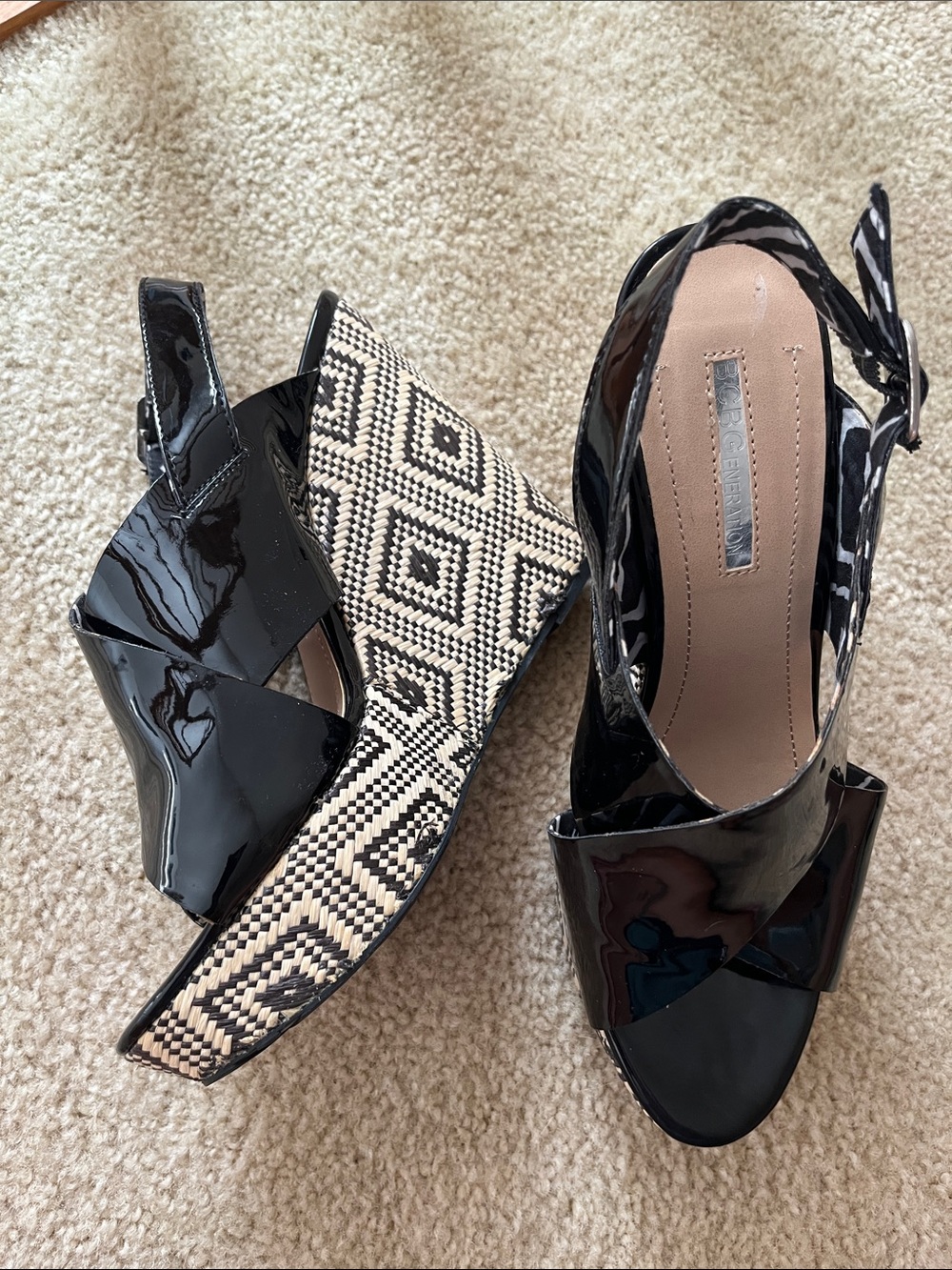 BCBGeneration Patent Black Wedge Sandals with Patterned Straw Platform